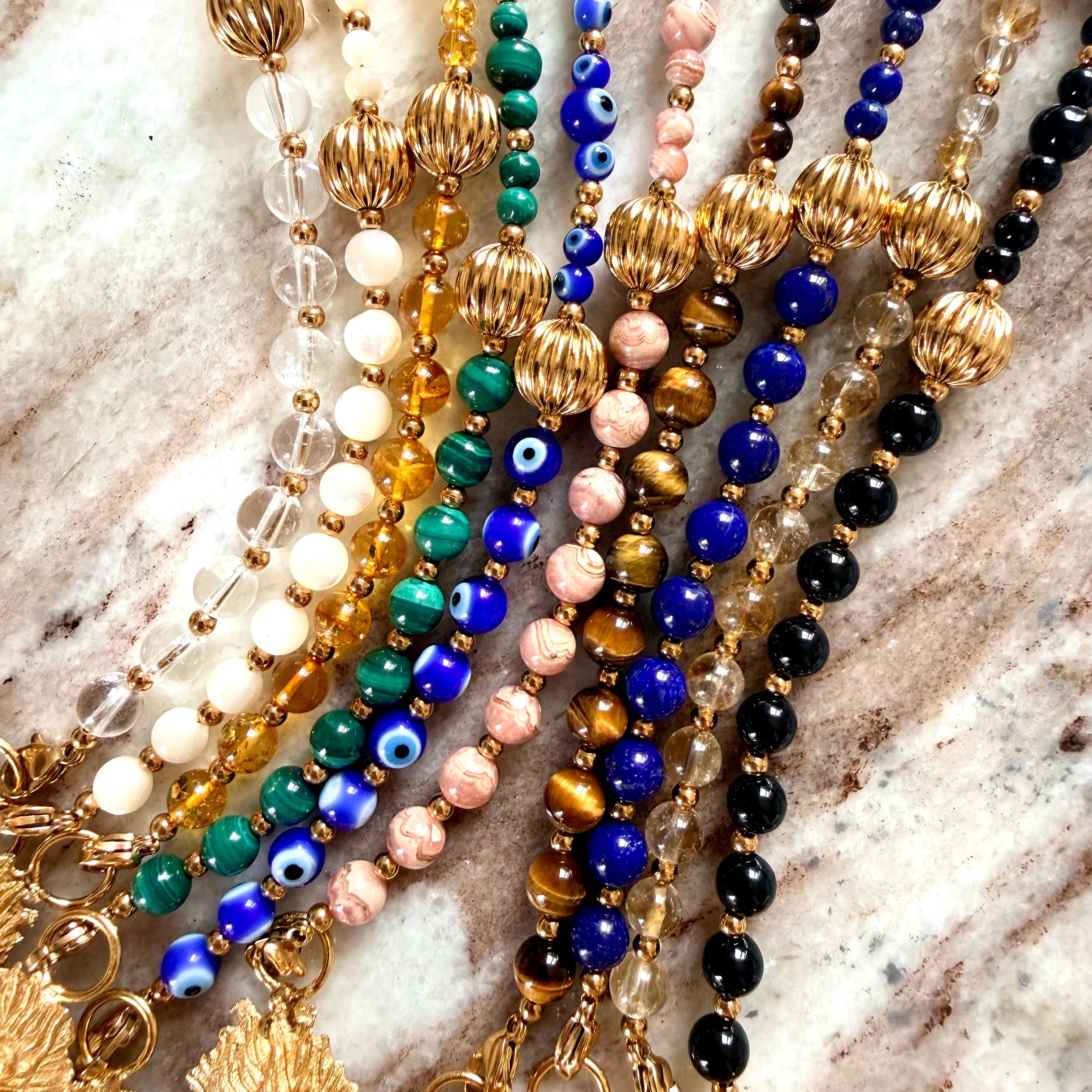 Talisman Ex-Voto avec sa ligne de perles