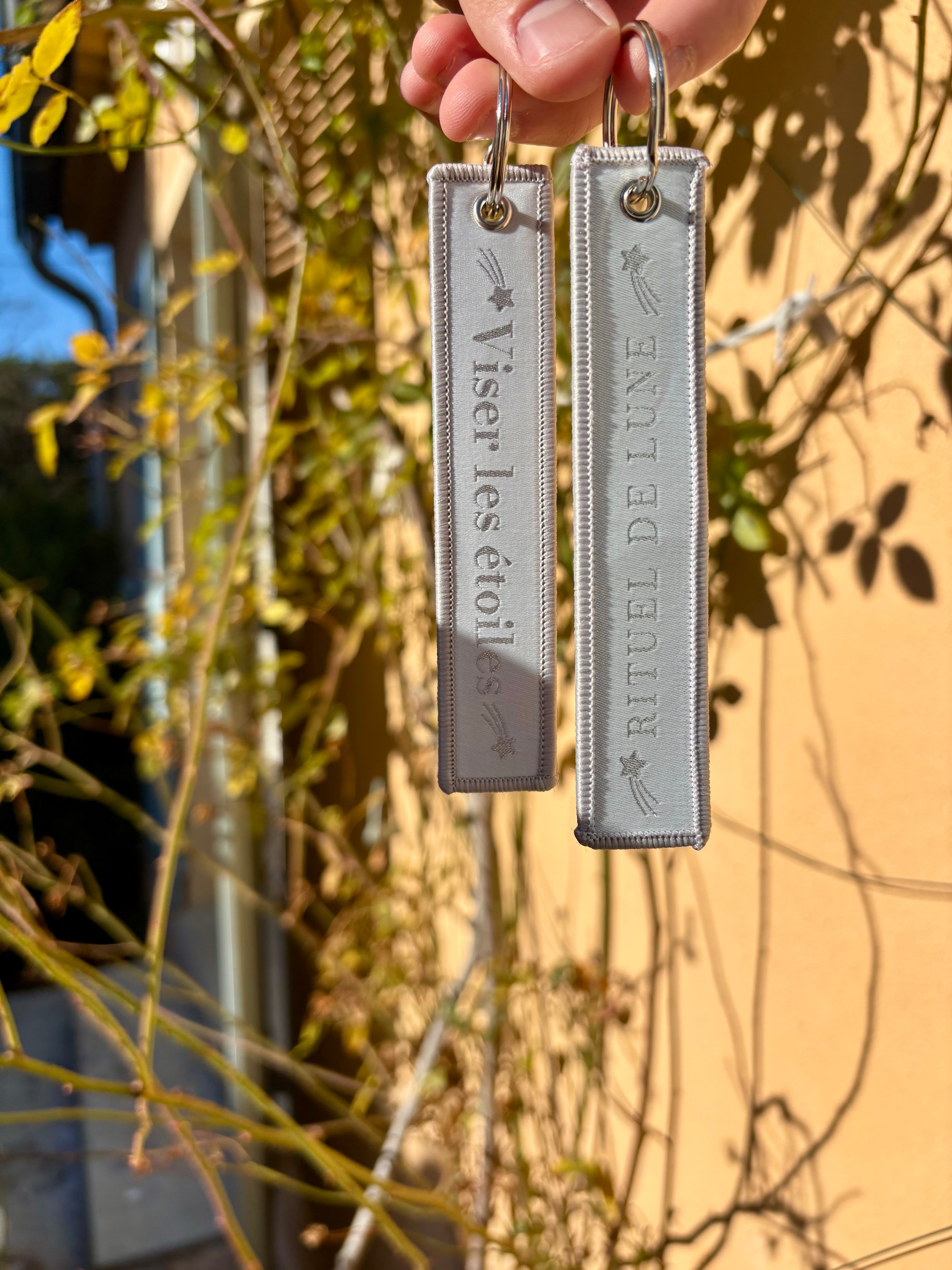 Porte clés Ruban à message viser les étoiles