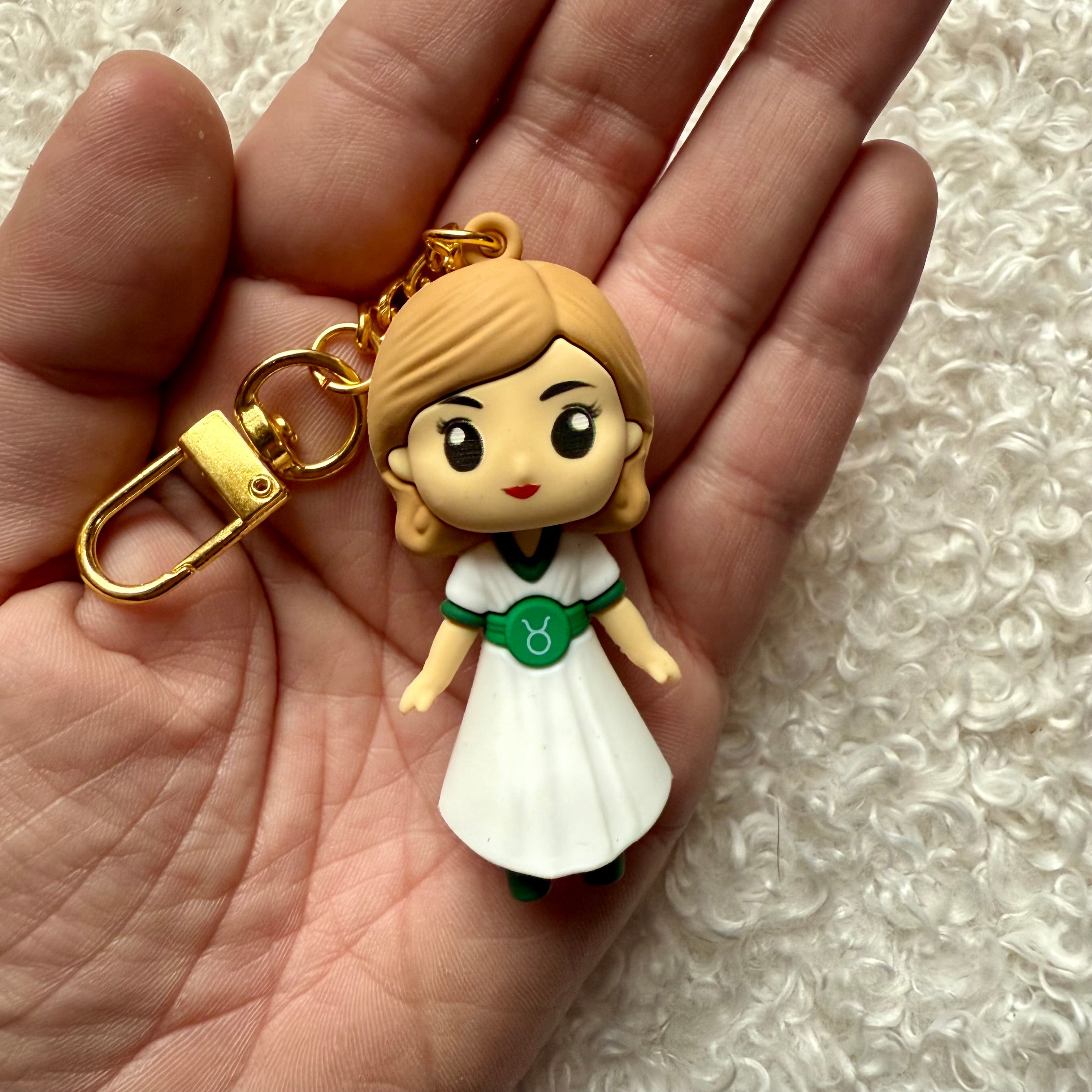 Poupée héroïne astro taureau à clip