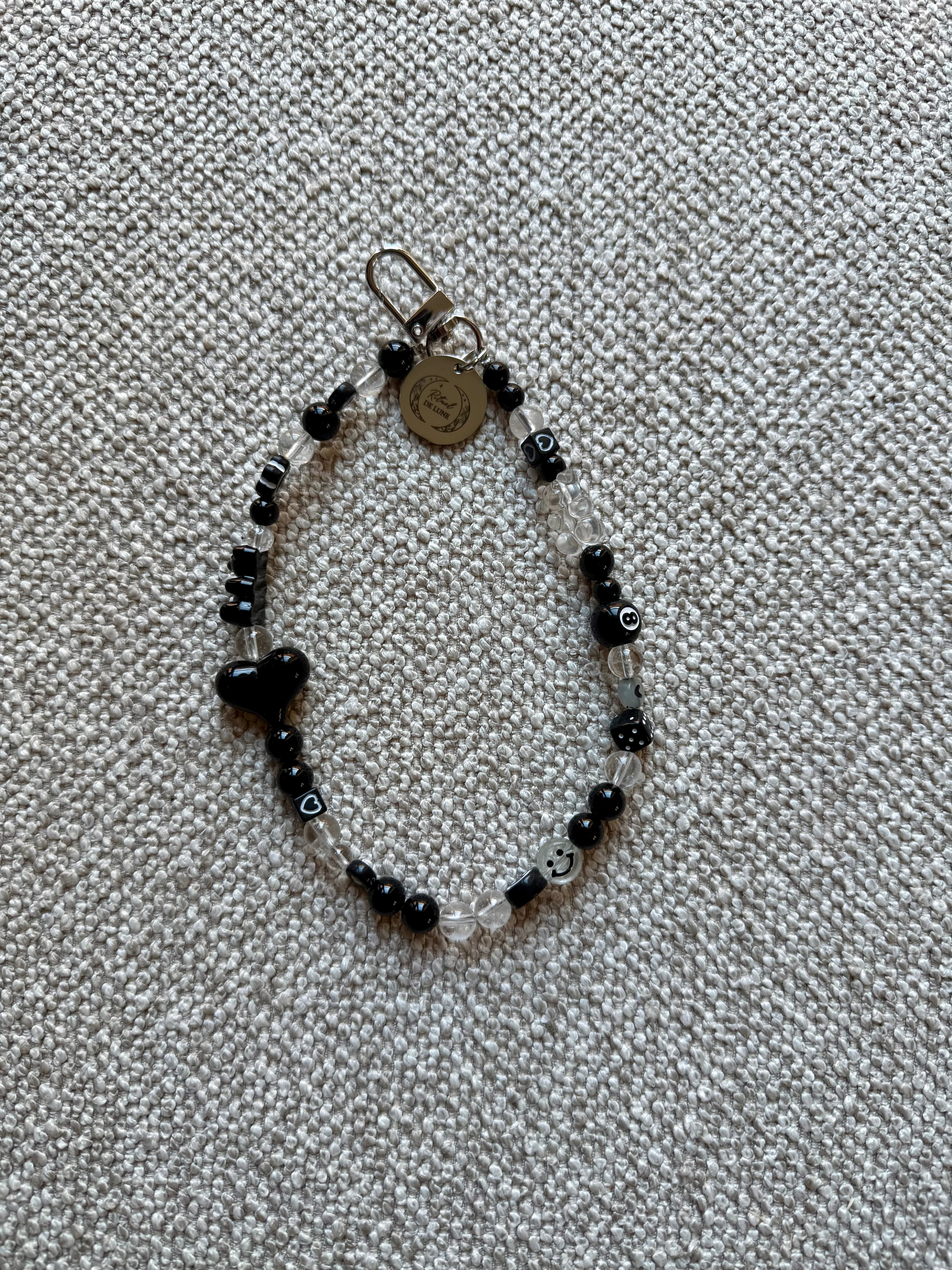 Tour de perles cristal de roche, onyx noir et perles fantaisies à clip