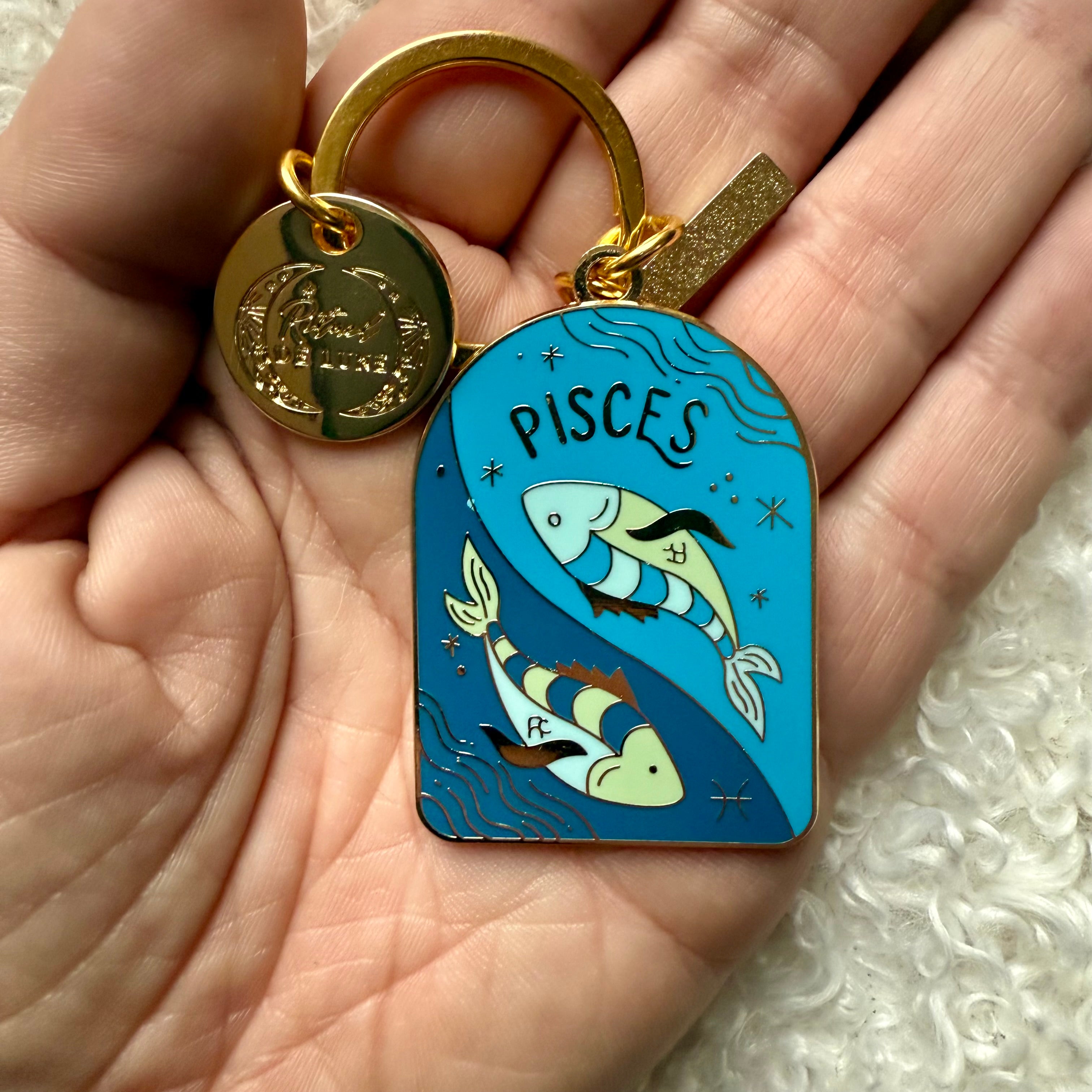 Porte clé plaque astro poissons