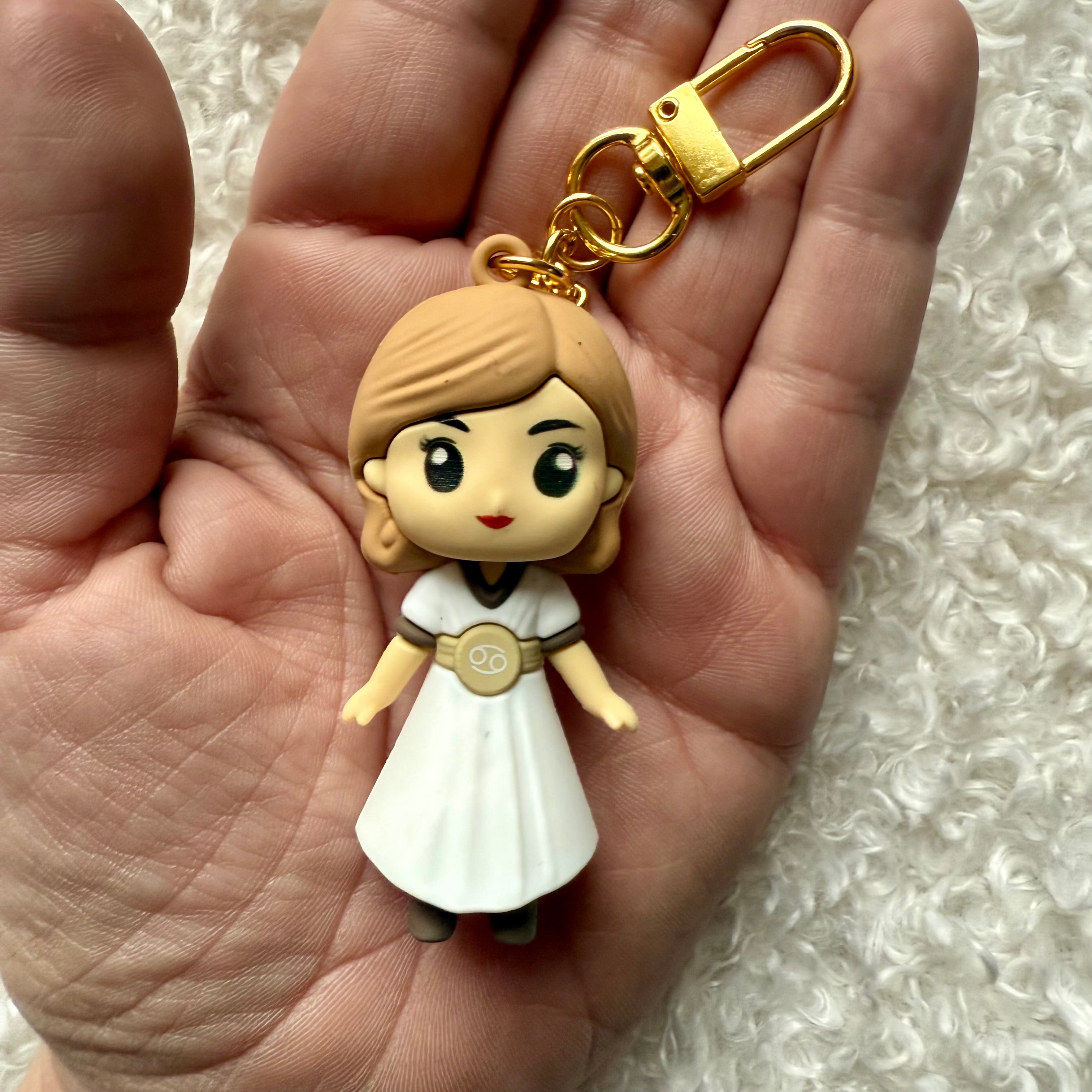 Poupée astro cancer à clip